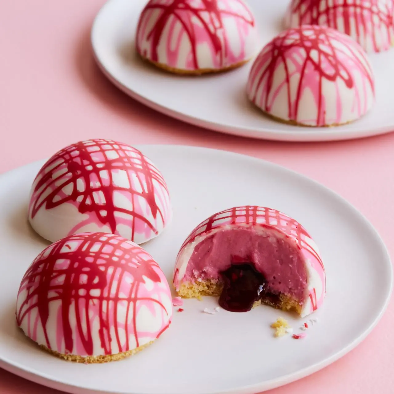 https://food.fnr.sndimg.com/content/dam/images/food/fullset/2019/3/15/0/FNK_RASPBERRY-LEMON-WHITE-CHOCOLATE-DOMES-H_s4x3.jpg.rend.hgtvcom.1280.1280.suffix/1552679627060.webp