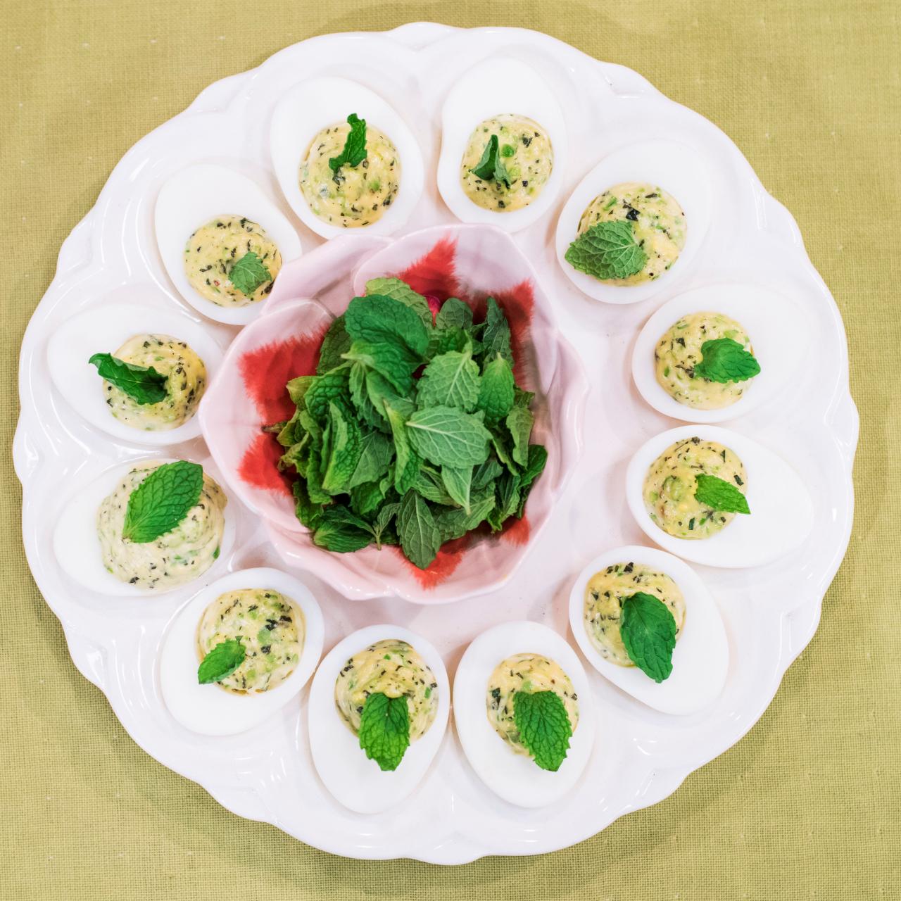 https://food.fnr.sndimg.com/content/dam/images/food/fullset/2019/3/27/KC2013_Minted-Pea-Deviled-Eggs_s4x3.jpg.rend.hgtvcom.1280.1280.suffix/1553723567212.jpeg