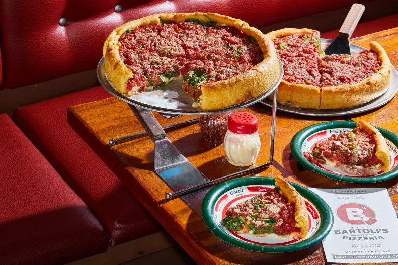 If you want to taste the classic kind of deep-dish pizza from the 1960s that spawned the modern deep-dish imitators (who unfortunately have almost ruined the form by piling on cheese and insipid tomato sauces until you're left with tasteless gut bombs), Bartoli's is the place. The pie is thick, but the heft is tasteful. The golden crust has a cornlike perfume, and the thick, chunky sauce is lustrous and peppery.