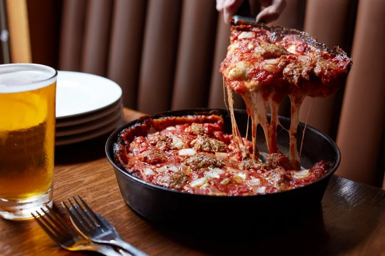 The pie at Pequod's is not entirely a pure Chicago-style deep dish. It's more of a hybrid of Chicago style and the focaccia-like bread crust of Sicilian "grandma" pies. What's absolutely distinct and gives it the edge, literally, over other deep-dish comers is the halo of crispy blackened cheese that rims the outside of the pie. It looks like it's burnt, but it's just a deep caramelization that's nutty, smoky and better than any single ingredient you could top a pizza with.