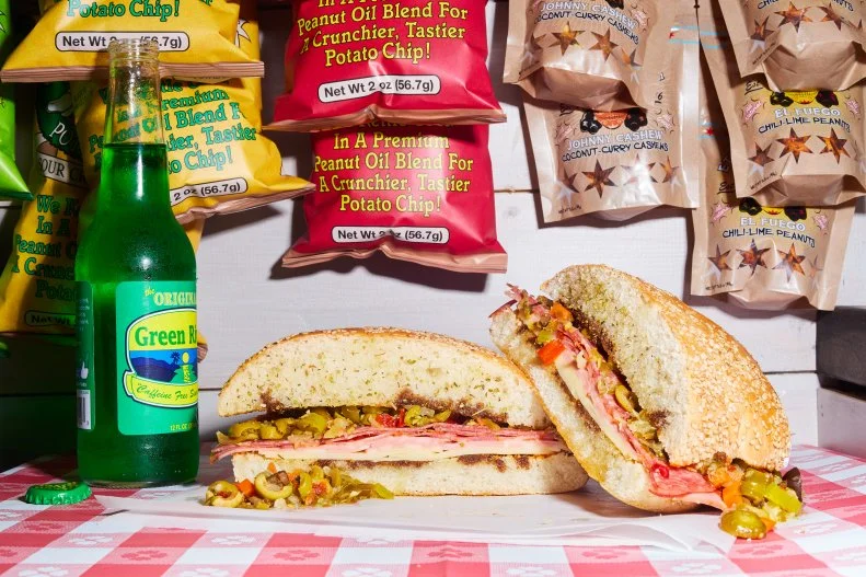 Technically we’re cheating here, as the cost ($12.95) exceeds our cap of $10, however, the UFO-sized circle of sesame seed-studded bread overflowing with sliced-to-order mortadella, salami, capicola, and olive salad is so massive, it will feed two people. If you’ve ever had the original muffuletta at Central Grocery in New Orleans, you’ll appreciate the version from Rosie’s (ask them to hold the balsamic drizzle), which is best held for a few hours before eating, so the briny olive oil juice soaks in to the bread and marinates it.