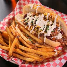 The Chili Cheese Bratwurst as Served at Barley's BrewHub in Kennewick, Washington, as seen on Diners, Drive-Ins and Dives, Season 29.
