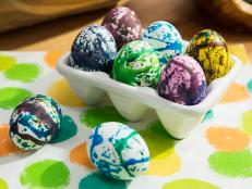 Jeff Mauro makes Spinning Tie-Dye Eggs using a salad spinner for Easter décor, as seen on Food Network's The Kitchen