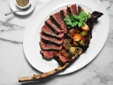 There are plenty of steak options in Chicago's River North neighborhood, but RPM sets the bar for quality and variety of beef. For traditional meat-and-potato types, it doesn't get much better than a 28-day prime dry-aged New York strip, cut by hand at Master Purveyors in the Bronx. But the most-luxurious cut on the menu is the monstrous 42-ounce Mishima Tomahawk featuring American wagyu raised in Tacoma, Washington, that's brushed with beef butter to add even more intense fatty flavor.