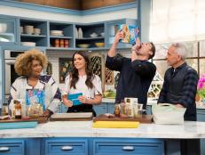 Sunny Anderson, Katie Lee, Jeff Mauro, and Geoffrey Zakarian, play a round of Spring Fling, as seen on Food Network's The Kitchen