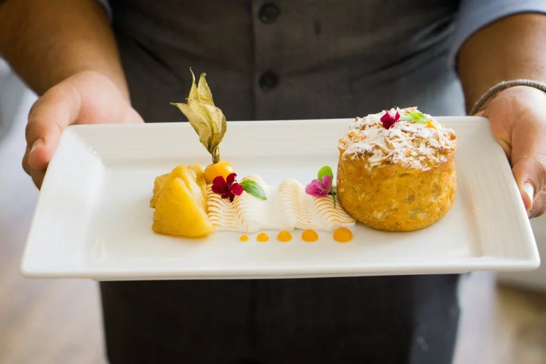 On weekends, when the morning meal can get the appropriate two-hour time window it deserves, Miami folks set aside their empanada-coffee routines for a leisurely boozy brunch outside. And on these weekend menus, the more creative multicultural chefs really let their fruit flags fly. With fresh mango, guava, pineapple, coconut, key lime, mamey and obscure fruits like guanabanas in abundance, offerings on the sweet side of the menu can be like nothing you’ve seen before. Case in point: this beautiful, puffy personal-sized coconut cake at Ad Lib, made with “first of the season” fresh Florida mangoes and a side flourish of pineapple. It’s not a pancake, nor a muffin, and it breaks the rule that says you can’t have cake for breakfast. Yet, it comes from the great minds behind Yardbird, and they pretty much wrote the rules on breakfast in this town.