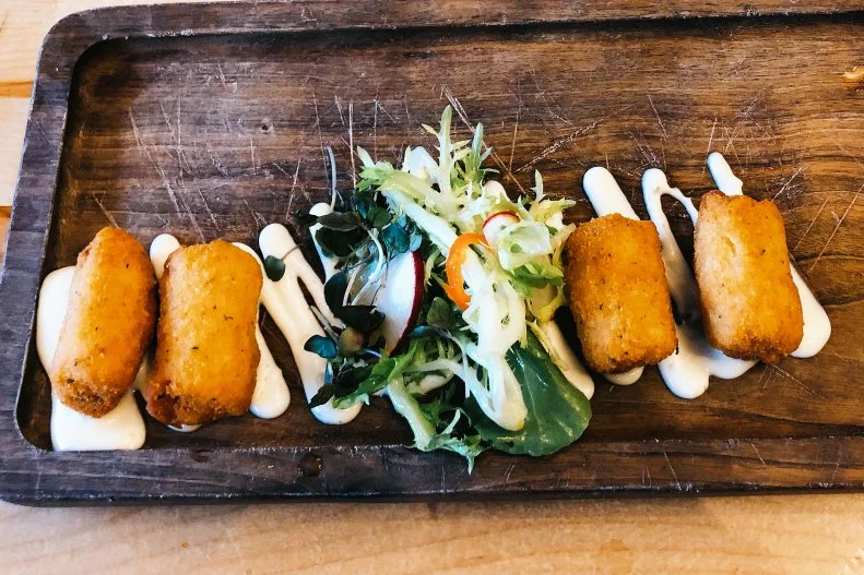 These little oblong carbo-bomb bites are another obsession that Miami shares with other cultures around the world. The local style of croquetas comes from Cuba, not Europe — in fact, many Miami Cubans seem to believe that Cuba created the croqueta and bestowed them upon Miami. (Puerto Ricans and various other Latino nationalities will refute this, of course.) Croquetas are made of a mixture of ground beef or ham, potatoes or rice, possibly breading, maybe seafood, maybe vegetable paste, often a bechamel and/or white sauce. The ingredients are formed into balls or cylinders, rolled in bread crumbs and deep fried. Doce Provisions, a Latin gastro-taverna in Little Havana, doesn’t do the most authentic croquetas (those would be ham and cheese for under $1 each) — but its chorizo version made with Miami Smokers’ spicy meat are a must on any croqueta tour of Miami. The rice ones are also delicious.