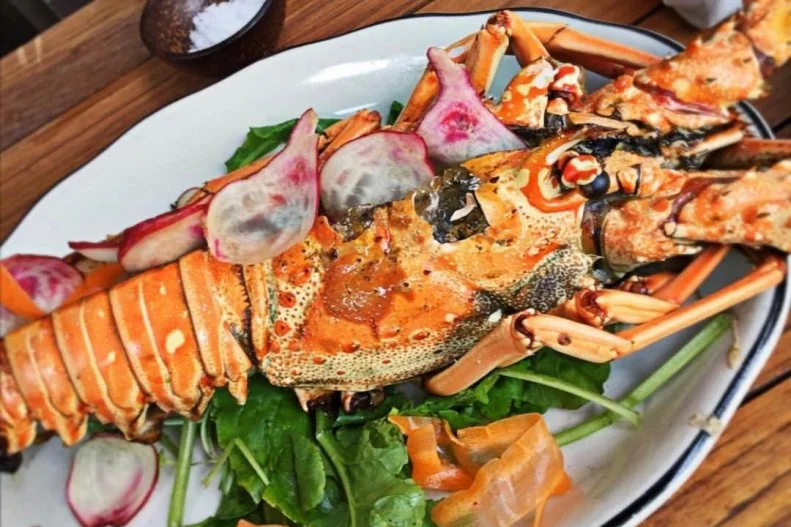 Cold-water lobster is flown into Miami year-round and available at most spendy steak and seafood houses. But the Florida lobster, cousin of the Caribbean lobster, is only available in season — starting in August, winding down in winter—and they’re getting harder and harder to find here, since the majority are shipped to China. A few local chefs have both the will and the fisherman connections to keep Florida lobster on the menu for at least a month or two — James Beard winner Michael Schwartz being one of them, of course. This South Florida icon always has local seafood on the menu at his flagship restaurant, Michael’s Genuine, whether it’s Florida shrimp, exotic lionfish, bycatch (lesser-known local fish that people wouldn’t normally think of eating), highly prized stone crab or, in the month of August, gorgeous wood-grilled Florida lobster over fresh veggies.