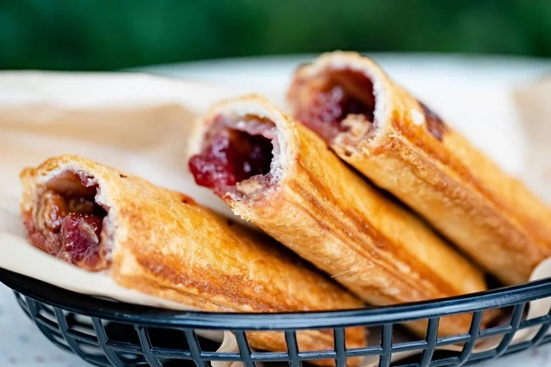 These flaky glazed Cuban puff pastries are a ubiquitous Magic City snack. Guava cream cheese is the standard, but they’re made with other sweet and savory fillings. They’re easily available at the airport, in Publix, in neighborhood bakeries all over the city and in their ultimate form at glossy New World restaurant Ariete for Sunday brunch. This last mention seems improbable, until you know that Ariete sous chef Giovanni Fesser has become so famous for his gourmet pastelitos that he now goes by the Miami superhero name Pastelito Papi. Since his pastelitos have outgrown their Sunday-only role, they’re also available all days at Ariete’s new offshoot Chugs, a Cuban diner in Coconut Grove.  Try the PB&G, a clever mashup of guava and PB&J.
