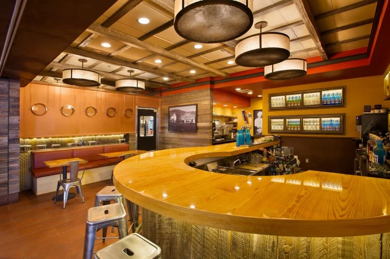 Park City’s favorite distillery has an airport location with many of the spirits you can find at the original locale. And although you can’t ski up to this version, you can still sip a whisky flight or a handcrafted cocktail made with local spirits, like the smoky Campfire whiskey. Hungry? Chow down on saloon bites like sourdough pretzel sticks with whiskey beer cheese or a bison pastrami Reuben with Swiss cheese, jalapeno sauerkraut and house thousand island.