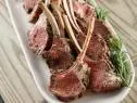 Close-up of Rosemary Rack of Lamb with Best Tzatziki, as seen on Barefoot Contessa: Back to the Basics, Season 16.