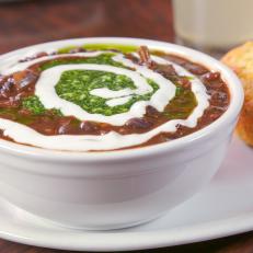 The Black Bean Chili with Jalapeno Cornbread Muffin as Served at Upper Crust Bakery and Eatery in Chico, California, as seen on Diners, Drive-Ins and Dives, Season 29.