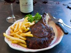 <p>Cat Cora is in the know and she knows to come to this restaurant Monday through Wednesday nights for the juicy burger with bacon, avocado and mango ketchup. The delicious beefy treat is seasoned with a secret blend of spices, but you must sit at the bar to get a bite of this special burger.</p>