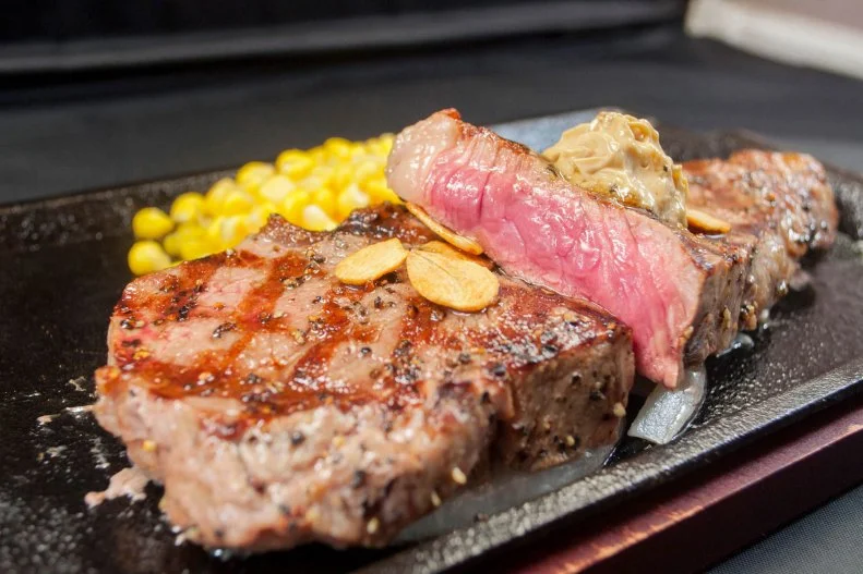 Since fist sizzling a steak in Tokyo in December of 2013, this chain of steakhouses has opened more than 100 locations in Japan and, in the span of a couple years, nine in New York City. Why is it so popular? It serves super-thick high-quality meats quickly at very reasonable price points. There’s just one catch: It’s standing room only. Guests get a spot at the counter where they order drinks and sides, then head to the butcher station to pick from a 40-day wet-aged USDA choice aurora angus beef ribeye, sirloin or filet by the ounce. Each one is cut to order and weighed while you’re watching, then cooked over an open fire and served on a sizzling cast-iron platter with an optional drizzle of Japanese soy-based steak sauce.