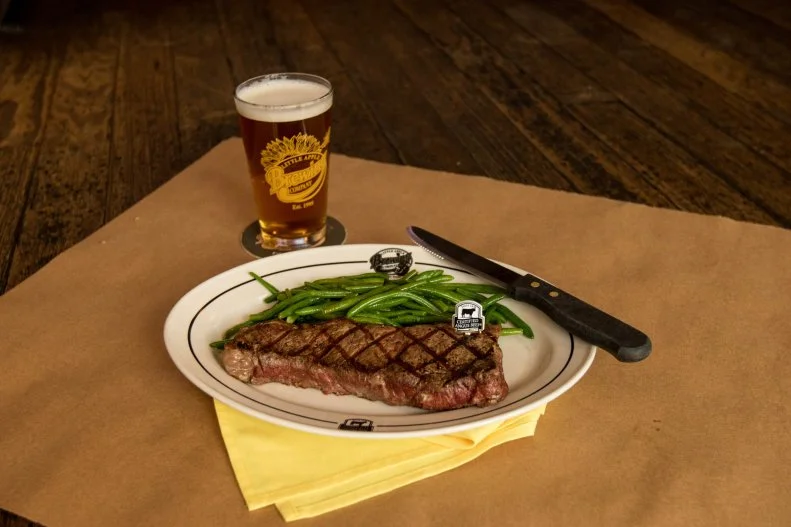Little Apple Brewing Co is Manhattan, Kansas’ makes its own beer as the ideal pairing for beef. Open since 1996, the restaurant and brewery serves certified Angus beef, sourced from local and regional producers, earning four Kansas Beef Backer Awards and a National Beef Backer Award. The preparations aren’t fancy, but they’re perfectly prepared. Choose from porterhouse, ribeye, filet mignon, top sirloin and the KC strip.
