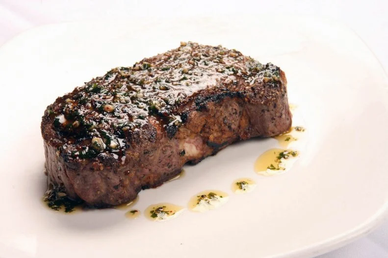 It’s a story you’ve heard before: guy or gal makes it big in his or her hometown, then moves to a bigger city to reach the pinnacle of fame. Many hometown heroes never make it back, but in the case of Cleveland, the talent always seems to return. LeBron James did. And so did Peter Vauthy of Red, the Steakhouse, whose South Beach restaurant was hailed as the best in Miami. Vauthy debuted an outpost in Cleveland, which is now one of Ohio’s top destinations for meat. Steaks are aged a minimum of 28 days, seasoned with kosher salt, peppercorn and “aglio brushing” (garlic in Italian), then seared in the broiler to seal in all the juicy flavor.