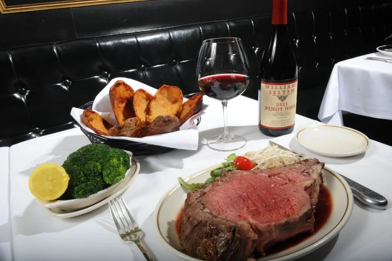 Intended to throw back to the elegant supper clubs of 1940s Manhattan when it opened in Baltimore in 1965, this Baltimore prime rib specialist got in on the retro trend long before it became cool again. The place quickly became a destination for its tuxedoed waitstaff, live piano and bass players, and its delicious food. Regulars rave about the crab cakes (it is Maryland, after all), tender filet mignon and the Key Lime pie, but of course the specialty is the namesake dish, a thick slice of juicy beef prepared to the ideal medium rare. Each tender slab nearly takes up the entire plate, which comes adorned with a pile of fresh horseradish to spice it up as much or as little as you like.