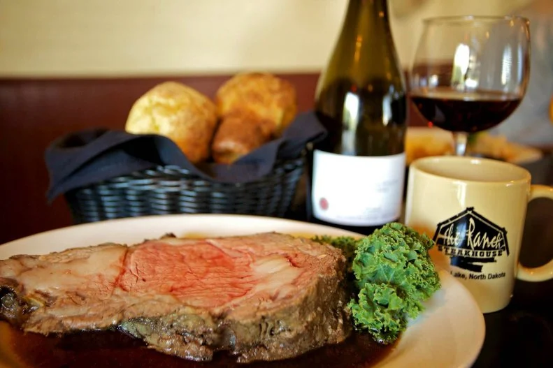 The big red barn that is home to the Ranch Steakhouse has been attracting traveling salesmen, hunters and locals from all around North Dakota since it opened on a family homestead back in 1946. The remote restaurant is more than two hours north of both Bismarck and Fargo, but it’s still garnered a reputation as one of top steakhouses in the state. To this day, it serves certified Angus beef at a comparative steal. A 12-ounce New York strip goes for $25 including soup or salad and choice of side. A seven-ounce petite top sirloin costs a whopping $16. But don’t let the affordable prices fool you: these steaks are just as good as the ones found at its pricier counterparts.