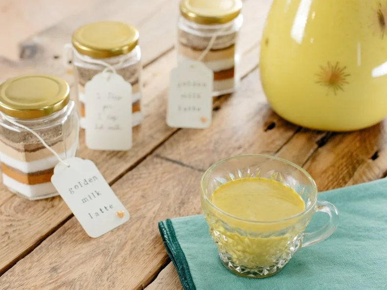 Host Molly Yeh, making her Golden Milk Latte, as seen on Girl Meets Farm, Season 3.
