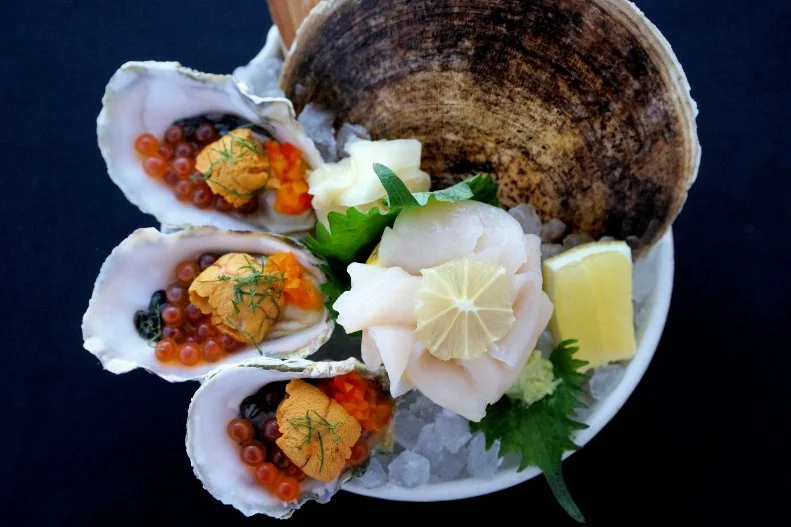 Venture out beyond the bright lights of the Vegas strip and discover this hidden gem helmed by Californian chef Dan Krohmer tucked discreetly in a retail strip. The dining room, furnished with funky, oceanic-inspired art, is welcoming and comfortable, but sit at the counter so you can peer into all of the glass cases filled with fish and the action-packed open kitchen. Deviled eggs are spicy and filling, topped with golden fried oysters and fresh jalapeño, and the blue crab-stuffed hushpuppies served with spicy remoulade are meant to be double dipped. The menu, though interesting and complex in its flavors, does not take itself too seriously — try the French toast, served in individual squares and topped with a dollop of crème fraiche and caviar, and the kimchi fried rice pairs well with everything.