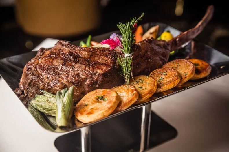 Scotch 80 PrimeIn Sin City, there are steakhouses a plenty, but the intense style and attention to detail brought forth by the folks at Scotch 80 Prime at the Palms is unparalleled. Pre-dinner cocktails, like a traditional Manhattan or smoky old-fashioned, are a lively way to kick things off — here, they are expertly crafted tableside based on each guests’ preference. The caviar presentation is equally as eventful, with traditional accompaniments, but tack on a round of Stoli shots for a “legendary” experience. Sautéed foie gras, subtly sweet with a strawberry-red wine reduction, should be added on to your steak, and most definitely save room for the fire and ice banana split, also prepared right before your eyes, with fresh, hand-turned vanilla bean ice-cream and a slew of colorful candy toppings.