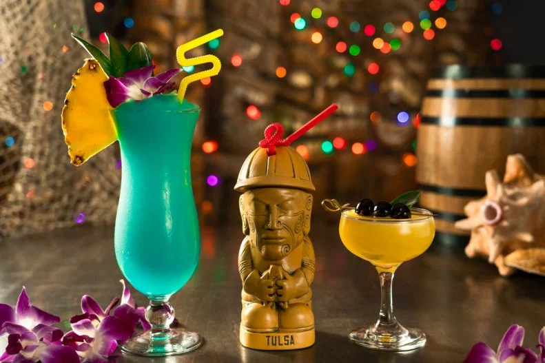 This tiki bar in the Brady Arts district has a patio that overlooks the whole city. When the weather allows, the Saturn Room even has a “swim up” window where visitors can walk up to a window and get a drink like a macadamia nut Chi Chi or one of their house cocktails made with freshly squeezed juices and homemade syrups. In keeping with the aquatic theme, puffer fish lights are scattered throughout the space as are giant fishing nets. Pick up one of their unique mugs – the Golden Driller is a nod to the Golden Oil driller statue in town.