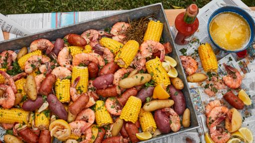 https://food.fnr.sndimg.com/content/dam/images/food/fullset/2019/5/14/0/FNK_CLASSIC-OUTDOOR-SHRIMP-BOIL-H_s4x3.jpg.rend.hgtvcom.511.288.suffix/1557848724223.jpeg