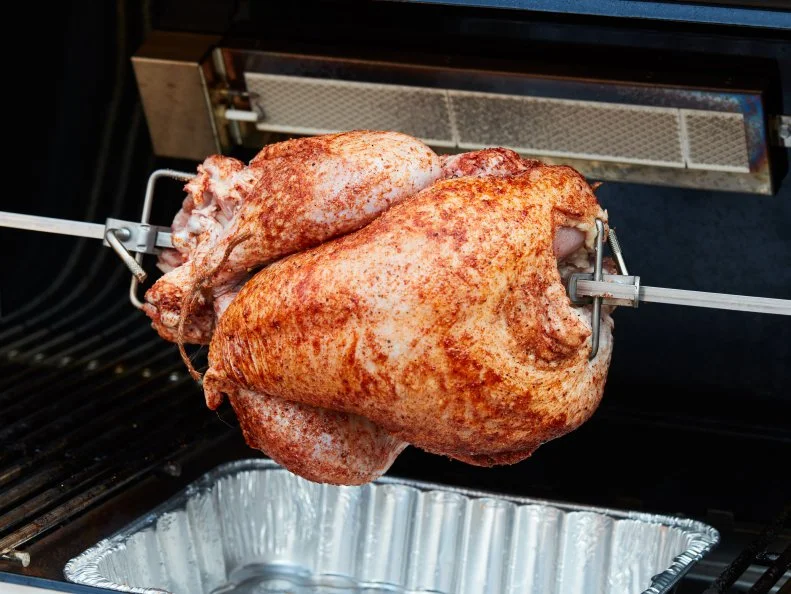Food Network Kitchen’s Grilled Rotisserie Turkey with Stuffing.