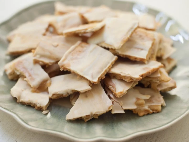 Close-up of White Chocolate and Peanut Butter Sweet and,Saltine.