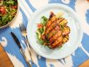Robert Irvine makes Peach BBQ Chicken with Tomato Cucumber Salad and Sweet Potato, as seen on Food Network's The Kitchen  Season 21.