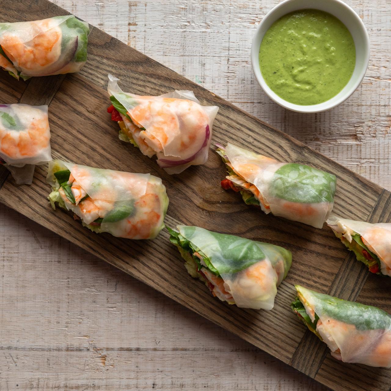 https://food.fnr.sndimg.com/content/dam/images/food/fullset/2019/5/17/0/WU2207_Shrimp-Pesto-Spring-Rolls_s4x3.jpg.rend.hgtvcom.1280.1280.suffix/1558112856166.jpeg