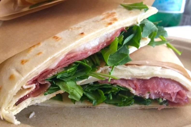 The Italian Homemade Company’s four locations are a testament to the popularity of the cuisine of Emilia-Romagna. In addition to their homemade pasta, they offer two signature sandwiches, piadina and cassone. Piadina is a stuffed and folded flatbread sandwich, cooked on a griddle. The classic filling is prosciutto, arugula and melted stracchino cheese. At right around $12, it’s a filling lunch or dinner.