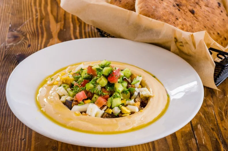 San Francisco is home to entrepreneurs from all over the world, some of them homesick for their native cuisine, which inspired Oren’s Hummus. The restaurant serves the flavors of Israel, tweaked for a California sensibility. The hummus sabich bowl ($13) tops the signature hummus with diced ingredients found in a sabich sandwich, namely fried eggplant, potato, hard-boiled egg, cucumber, tomato and chopped pickles as well as amba sauce and fresh herbs. This creamy and crunchy riot of flavors is served with two fluffy pita breads for dipping.