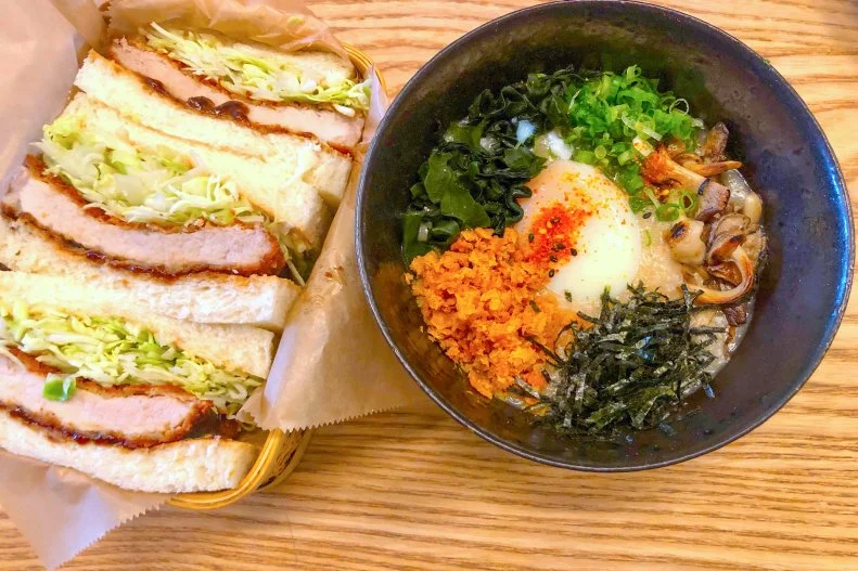 Japan’s crispy answer to a schnitzel sandwich, the katsu sando has been increasingly turning up on restaurant menus around the United States — as well as on so many Instagram feeds it's nearly impossible to miss. The simple and craveable sandwich features crunchy and juicy pork cutlets sandwiched between slices of pillowy Japanese milk bread. Sink your teeth into the heavenly version at Stonemill Matcha. San Francisco's constantly packed Japanese cafe combines tender breaded fried pork with sweet and savory tonkatsu sauce and refreshing cabbage slaw on soft white bread. 