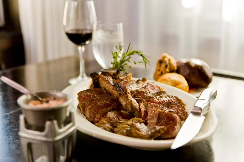 Prime 112 claims to be the first modern steakhouse in the US — a serious distinction — but they're not all talk. Since 2004, they've served Miami dishes like Kobe beef dumplings that would lead to chin-scratching from old-school chophouse maitre d's. They continue the Kobe experimentation with hot dogs ($28) and hamburgers ($30), but the most-luxurious thing on the menu is certainly the Japanese A5 Kobe at $230 for a 16-ounce ribeye. However if you'd like to save a few bucks (and put on a few extra pounds), go for the American-raised Mishima reserve wagyu at $175 for a 25-ounce bone-in ribeye.