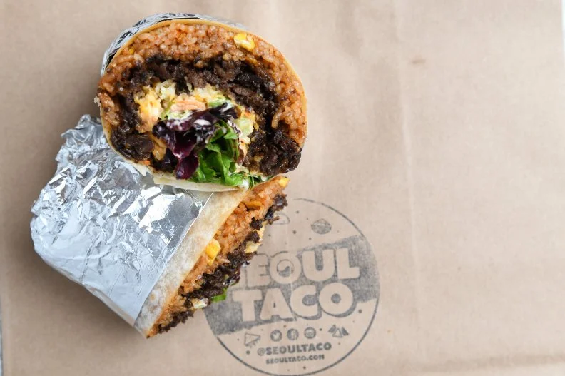 Though there are now brick-and-mortar Seoul Taco locations in Missouri and Illinois, the O.G. food truck remains a St. Louis staple. Open since 2011, when neither food trucks nor Korean food were prevalent in the city, David Choi’s Seoul Taco puts a contemporary, approachable spin on the Korean flavors and foods Choi grew up eating. The menu features bases such as burritos, tacos, nachos, and bowls, which diners can spin into their own Korean-fusion creations by adding items such as kimchi, bulgogi beef and gochujang peppers. Fan-favorites include kimchi-fried-rice-stuffed spicy pork burritos or bulgogi steak tacos, which nestles Korean barbecue-style beef into tortillas with mixed greens and sesame vinaigrette. You’ll find the truck at local breweries like Four Hands Brewery, as well as office parks and summer festivals.