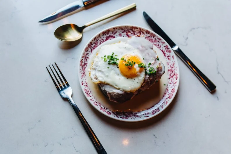 The exposed brick and wooden beams at Geist reveal the historic building’s original use as a blacksmith shop, and also provide a charming retreat. There’s a champagne garden on the patio, open year-round, and on Saturdays and Sunday from 10 a.m. to 3 p.m., the restaurant does a fine list of brunch fare. Start with a prosecco mimosa before moving on to lox on a house bagel with caper cream cheese, or a meat and cheese board loaded with a broad selection of cured slices. From there, go with the shrimp and grits topped with a poached egg or the eggs benedict with house-cured ham — both are hearty and satisfying.