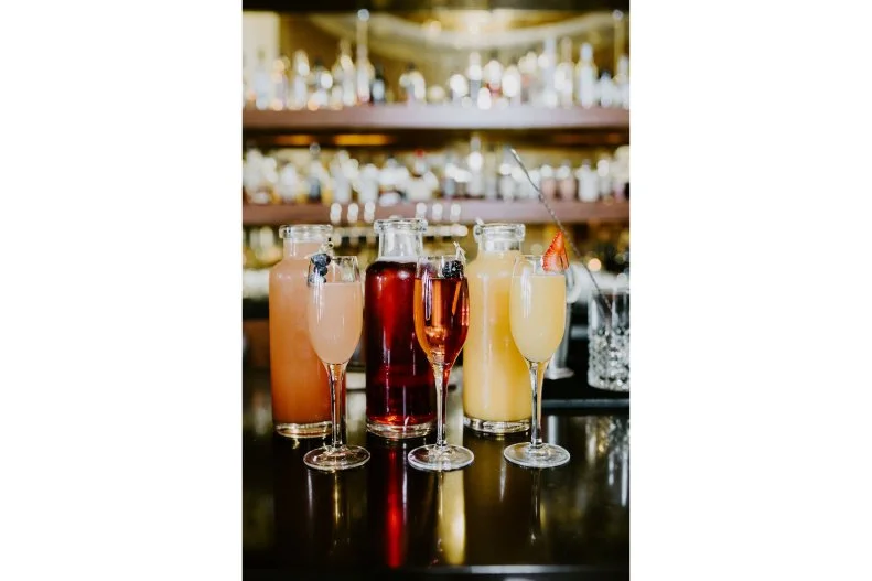 Set in a historic 1940s-era theater, Sinema lives up to its locale. A grand lobby with a curved staircase leads to an upstairs bar and dining room, and velvet tufted booths and exposed brick walls can be found throughout. Weekends find the place bustling from 10 a.m. to 2 p.m., which is when they offer bottomless brunch. Stations are set throughout the space, each with its own bounty: a biscuit bar with seemingly endless toppings, a decadent waffle bar on the second floor, a panini station and more. You can also order off the menu for chilaquiles or Fruity Pebbles French toast. Also bottomless? The extravagant Bloody Mary and mimosa bars on each floor.