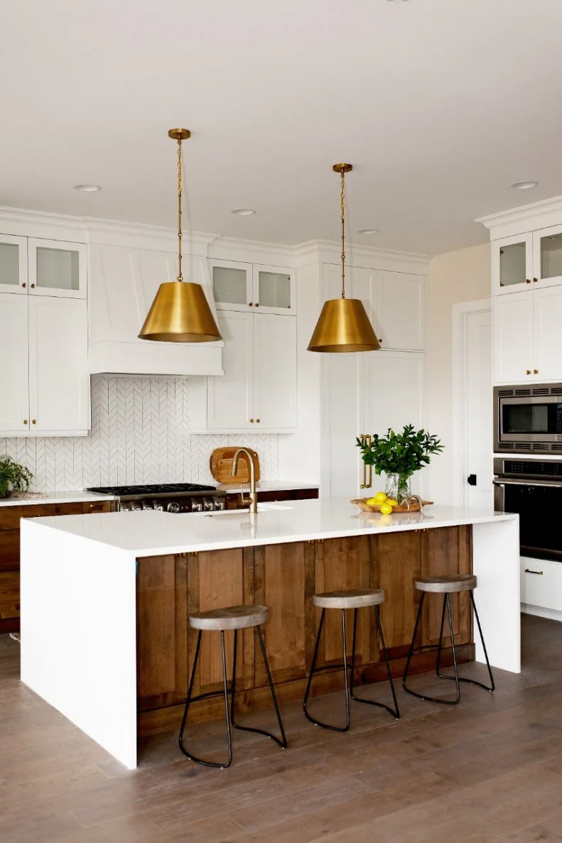 The breakfast bar creates additional functionality in the kitchen area by giving the home a casual dining option. 
