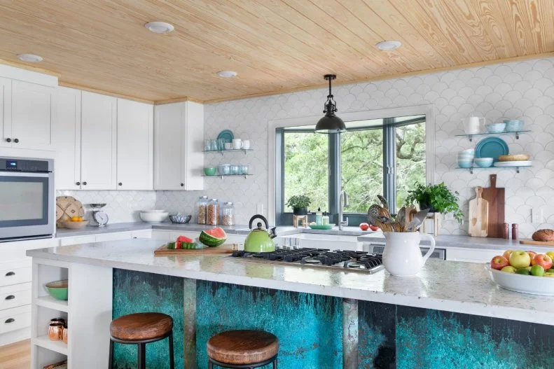 With a breakfast nook on one side, a pantry and office on the other side and an open connection to the living and dining rooms, the DIY Network 2016 Blog Cabin kitchen is the true heart of the home.