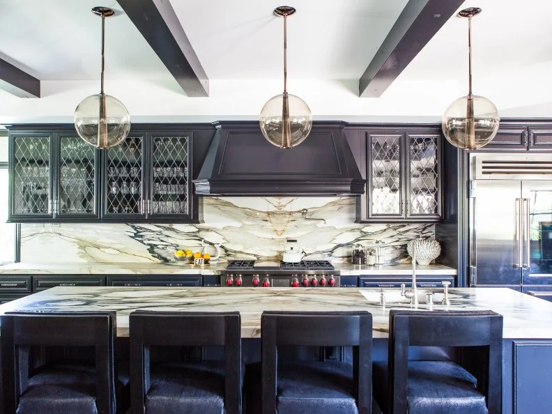 This project is all about classic elements with pops of surprises. Black and white is set as the foundational pallet, with bold color and pieces accenting the space, leaving your senses feeling excited and happy.