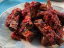 Close up of “Pork ribs with tomato glaze” ,as seen on Trisha's Southern Kitchen, Season 14.
