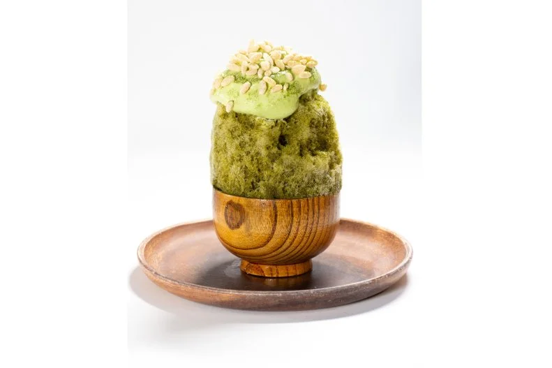 Owners Gaston and Theo bought an original hand-cranked kakigori machine to try to re-create the kind of shaved ice that Gaston had tried and loved in Japan. They succeeded and now appear at both Smorgasburg and the Canal Street Market with overflowing bowls filled with flavors like Strawberries & Cream, with fresh strawberry juice, black sesame brittle and whipped cream, and the bright green Matcha Mountain, made with pure Japanese matcha and a yuzu matcha foam and finished with puffed rice.