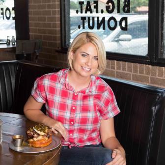 Host Courtney Rada at Gourdough's Public House' with the "Drunk Hunk" donut sandwhich, as seen on Where's The Beef, Season 1.