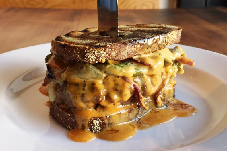 Jon Shook and Vinny Dotolo's meatier restaurant, Animal, naturally serves a hearty breakfast sandwich during brunch service. The Bodega Sandwich, available on the weekends from 10:30 a.m. to 2:30 p.m., stars ham, eggs and American cheese on a kaiser roll. If you don't need an egg in your breakfast sandwich, you could also go for the Boner Burger with the restaurant's "420 sauce," Jack cheese, poblano and red onion. Either way, you'll be leaving full.