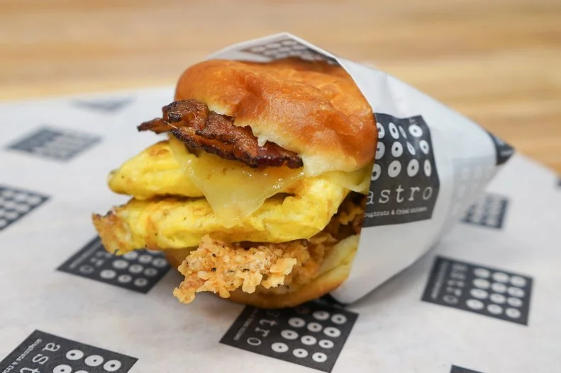 Childhood friends Elliot Spaisman and Jeff Halpern are responsible for making both doughnuts and fried chicken a part of breakfast. They're the creators of Astro Doughnuts, where you'll find The Works, a sweet and savory behemoth you won't be telling your doctor about. This breakfast sandwich is made with house-brined buttermilk fried chicken, a farm-fresh egg, bacon and white cheddar cheese, all piled between two savory doughnut buns, naturally.