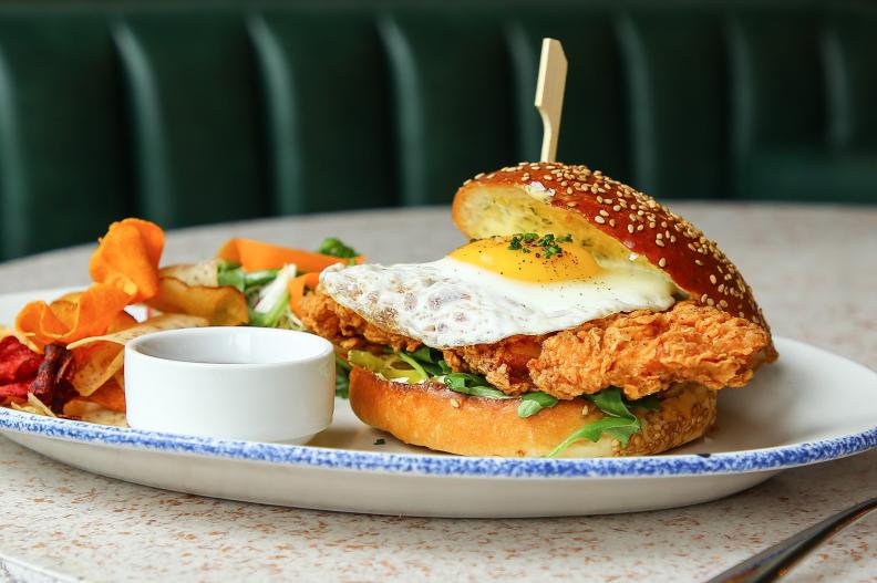 The massive West Hollywood hotspot Catch is a celebrity magnet as well as a great place for brunch. Book one of the restaurant's 340 seats and try the Chick N' Egg Sandwich with a sunny-side-up egg, organic crispy chicken, caramelized onions, pickles, arugula and herb mayo. Enjoy the see-and-be-seen atmosphere over some champagne, one of the best pairings possible with fried chicken.