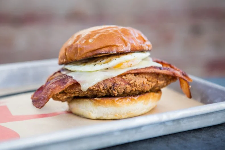 The Crack Shack, from Top Chef winner Chef Richard Blais, puts a spotlight on chicken morning, noon and night. Unlike most fried-chicken spots, The Crack Shack focuses on using top-notch, humanely raised poultry. The locally raised, antibiotic-free Jidori fried chicken is particularly great for breakfast in the Señor Croque. Crispy chicken, bacon, fried egg, cheddar and a miso-maple butter go perfectly together on a tasty brioche bun.
