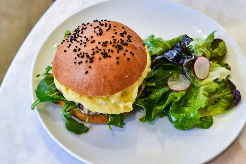 In East Hollywood, the bright and roomy Friends & Family by Chef Daniel Mattern and pastry chef/baker Roxana Jullapat is a place you'll want to hole up in all day, with friendly service and free Wi-Fi. The Eggwich is essentially a hearty breakfast platter snuck into a fluffy bun. You get a breakfast sausage patty, cheesy scrambled eggs, maple mayo and some greens with every bite. The sandwich is available daily from 8 a.m. to 3 p.m., in case you're hit with breakfast cravings later in the day.