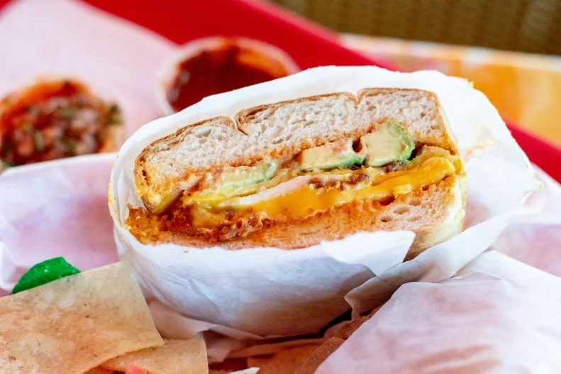 There's nothing fancy about Las Glorias Del Buen Comer in Silver Lake. It's right off the freeway, it doesn't feature indoor seating (although you can sit on a covered terrace), and you order at the window. But what the place lacks in ambience it makes up for in absolutely delicious food. The breakfast sandwich feels lovingly made, with eggs, ham, bacon or chorizo, and cheese on Mexican bread. You'd be wise to add some avocado.